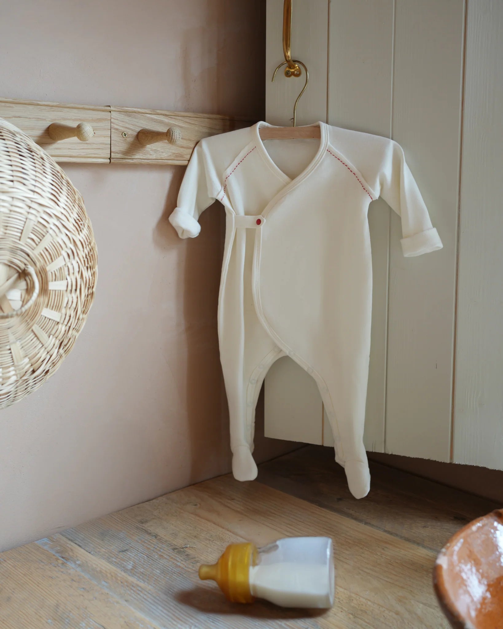 Flap footie- Milk w red stitching