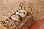 Load image into Gallery viewer, teddy bear sleeping in a rattan doll bed
