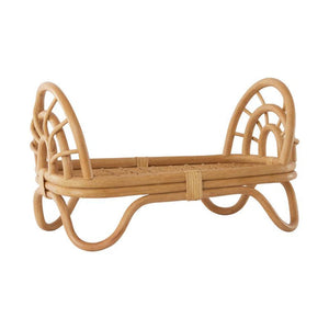 side view of rattan doll bed