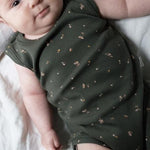 Load image into Gallery viewer, baby in sleeveless cotton green onesie
