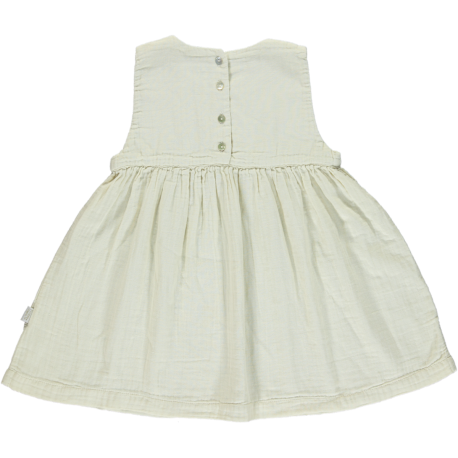 Creamy dress for baby girl with buttons at the back