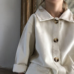 Load image into Gallery viewer, Girl in cream summer jacket 
